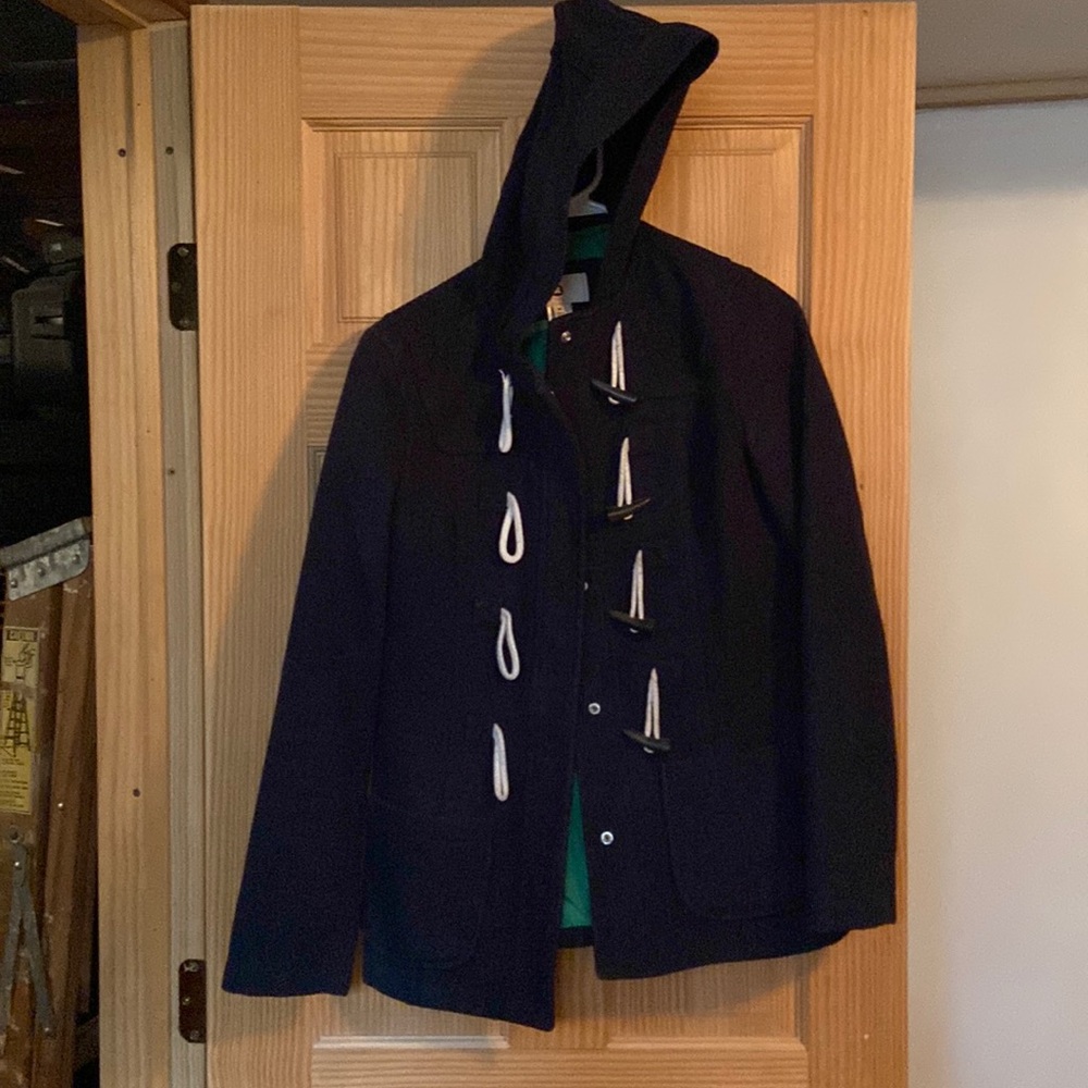 Dark blue pea coat. Button up with loop rope fasteners. Two front pockets & hood